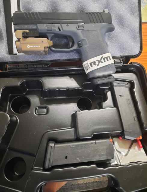 RUGER RXM w/ OLIGHT Baldr TACTICAL LIGHT